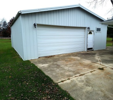 Lovely home awaiting your personal touch! If you love quiet on Earlville Country Club in Illinois - for sale on GolfHomes.com, golf home, golf lot