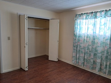 LARGE, SINGLE LEVEL HOME, SMALL PRICE!! This almost 2000 sq. ft on Cherokee Village North Course in Arkansas - for sale on GolfHomes.com, golf home, golf lot