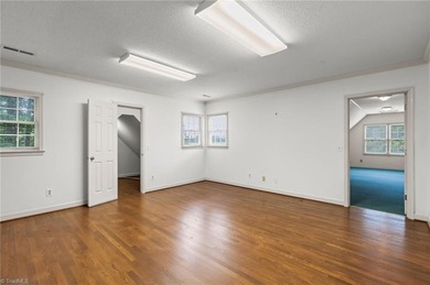 You would never know the size from the front BUT this has 4 beds on Greensboro Country Club - Carlson Farm Course in North Carolina - for sale on GolfHomes.com, golf home, golf lot