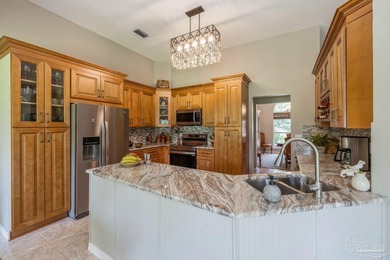 Situated on an oversized corner lot with lush landscaping, this on The Club At Hidden Creek in Florida - for sale on GolfHomes.com, golf home, golf lot