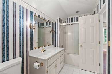 You would never know the size from the front BUT this has 4 beds on Greensboro Country Club - Carlson Farm Course in North Carolina - for sale on GolfHomes.com, golf home, golf lot