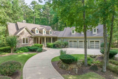 Set on 2.21 acres of beautifully landscaped grounds, this 5,000+ on Reynolds Lake Oconee - The Oconee in Georgia - for sale on GolfHomes.com, golf home, golf lot
