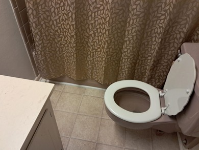 LARGE, SINGLE LEVEL HOME, SMALL PRICE!! This almost 2000 sq. ft on Cherokee Village North Course in Arkansas - for sale on GolfHomes.com, golf home, golf lot