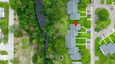 REAL NICE!!! NO REAR NEIGHBORS! WATERFRONT! NO FLOOD! This on Beacon Woods Golf Club in Florida - for sale on GolfHomes.com, golf home, golf lot