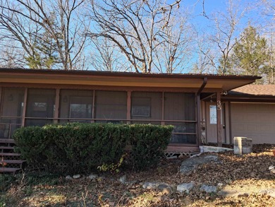 LARGE, SINGLE LEVEL HOME, SMALL PRICE!! This almost 2000 sq. ft on Cherokee Village North Course in Arkansas - for sale on GolfHomes.com, golf home, golf lot