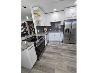 Live the Tampa Bay Life Style! Welcome to the Carefree on On Top Of The World Golf Course in Florida - for sale on GolfHomes.com, golf home, golf lot