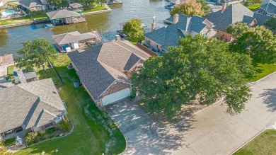 This is a wonderful lakefront home with a boat dock for one boat on Harbor Lakes Golf Club in Texas - for sale on GolfHomes.com, golf home, golf lot