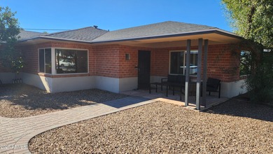 Get ready for care-free casual living in this mid-century style on Encanto 18 Golf Course in Arizona - for sale on GolfHomes.com, golf home, golf lot