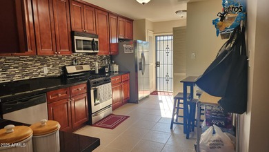 Get ready for care-free casual living in this mid-century style on Encanto 18 Golf Course in Arizona - for sale on GolfHomes.com, golf home, golf lot