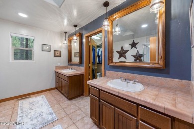 This fully furnished mountain home is perfectly positioned on on Torreon Golf Club in Arizona - for sale on GolfHomes.com, golf home, golf lot