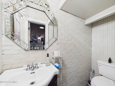 An Iconic French Quarter-Inspired Estate in the Heart of on LeTriomphe Golf and Country Club in Louisiana - for sale on GolfHomes.com, golf home, golf lot