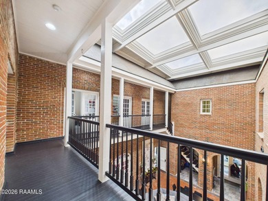 An Iconic French Quarter-Inspired Estate in the Heart of on LeTriomphe Golf and Country Club in Louisiana - for sale on GolfHomes.com, golf home, golf lot