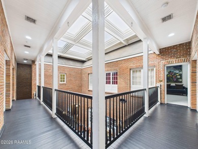 An Iconic French Quarter-Inspired Estate in the Heart of on LeTriomphe Golf and Country Club in Louisiana - for sale on GolfHomes.com, golf home, golf lot