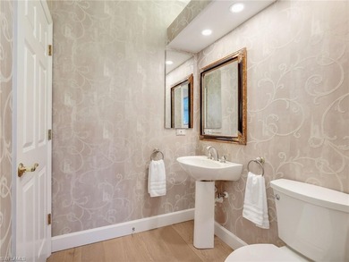 This masterpiece of elegance and comfort, perched on the 9th on Kensington Golf and Country Club in Florida - for sale on GolfHomes.com, golf home, golf lot