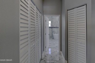 This newly remodeled 3-bedroom, 3-bathroom home in the desirable on The Grand Club - Pine Lakes Course in Florida - for sale on GolfHomes.com, golf home, golf lot