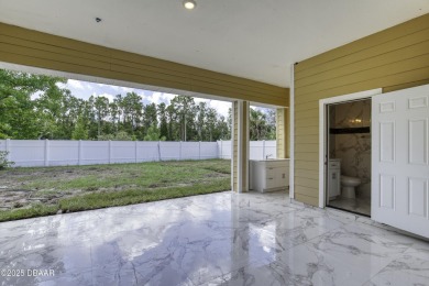 This newly remodeled 3-bedroom, 3-bathroom home in the desirable on The Grand Club - Pine Lakes Course in Florida - for sale on GolfHomes.com, golf home, golf lot