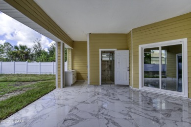 This newly remodeled 3-bedroom, 3-bathroom home in the desirable on The Grand Club - Pine Lakes Course in Florida - for sale on GolfHomes.com, golf home, golf lot