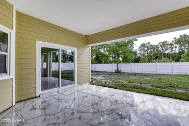 This newly remodeled 3-bedroom, 3-bathroom home in the desirable on The Grand Club - Pine Lakes Course in Florida - for sale on GolfHomes.com, golf home, golf lot