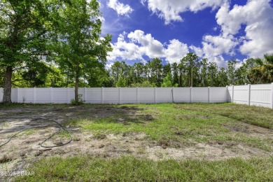 This newly remodeled 3-bedroom, 3-bathroom home in the desirable on The Grand Club - Pine Lakes Course in Florida - for sale on GolfHomes.com, golf home, golf lot