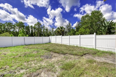 This newly remodeled 3-bedroom, 3-bathroom home in the desirable on The Grand Club - Pine Lakes Course in Florida - for sale on GolfHomes.com, golf home, golf lot