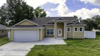 This newly remodeled 3-bedroom, 3-bathroom home in the desirable on The Grand Club - Pine Lakes Course in Florida - for sale on GolfHomes.com, golf home, golf lot