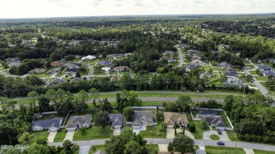 This newly remodeled 3-bedroom, 3-bathroom home in the desirable on The Grand Club - Pine Lakes Course in Florida - for sale on GolfHomes.com, golf home, golf lot