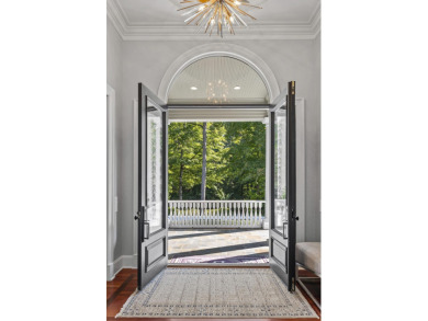 NEWLY RENOVATED AND MOVE IN READY, THIS 9,000 SQ. FT. RESIDENCE on Reynolds Lake Oconee - The Oconee in Georgia - for sale on GolfHomes.com, golf home, golf lot