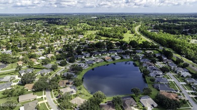 This newly remodeled 3-bedroom, 3-bathroom home in the desirable on The Grand Club - Pine Lakes Course in Florida - for sale on GolfHomes.com, golf home, golf lot