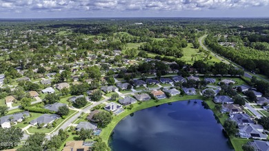 This newly remodeled 3-bedroom, 3-bathroom home in the desirable on The Grand Club - Pine Lakes Course in Florida - for sale on GolfHomes.com, golf home, golf lot