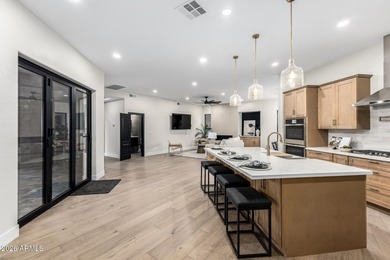 Modern elegance meets everyday comfort in this highly upgraded on The Legend at Arrowhead in Arizona - for sale on GolfHomes.com, golf home, golf lot