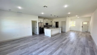This home has the perfect blend of luxury and comfort, open on Rotonda Golf and Country Club - Long Marsh  in Florida - for sale on GolfHomes.com, golf home, golf lot