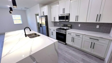 This home has the perfect blend of luxury and comfort, open on Rotonda Golf and Country Club - Long Marsh  in Florida - for sale on GolfHomes.com, golf home, golf lot
