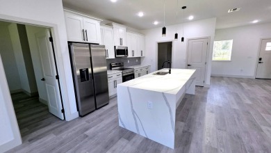 This home has the perfect blend of luxury and comfort, open on Rotonda Golf and Country Club - Long Marsh  in Florida - for sale on GolfHomes.com, golf home, golf lot