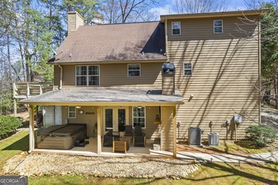 This 5-bedroom, 3-bathroom mountain retreat in the gated on Innsbruck Resort and Golf Club in Georgia - for sale on GolfHomes.com, golf home, golf lot