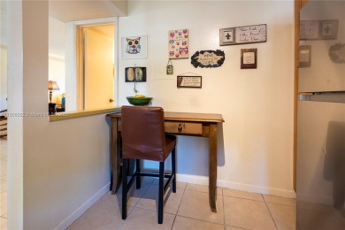 Charming one-bedroom, one and a half-bath condo in Hollybrook, a on Hollybrook Golf and Tennis Club  in Florida - for sale on GolfHomes.com, golf home, golf lot