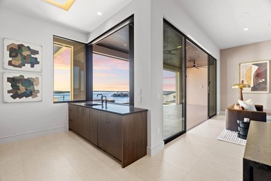 A Contemporary Masterpiece on a Private, Gated Peninsula. This on Apple Rock Golf Course - Horseshoe Bay in Texas - for sale on GolfHomes.com, golf home, golf lot