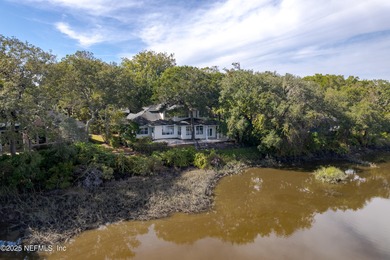Come explore this stately two-story residence offering a blend on Queens Harbour Yacht and Country Club in Florida - for sale on GolfHomes.com, golf home, golf lot