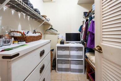 Charming one-bedroom, one and a half-bath condo in Hollybrook, a on Hollybrook Golf and Tennis Club  in Florida - for sale on GolfHomes.com, golf home, golf lot