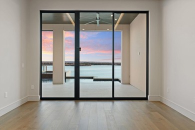 A Contemporary Masterpiece on a Private, Gated Peninsula. This on Apple Rock Golf Course - Horseshoe Bay in Texas - for sale on GolfHomes.com, golf home, golf lot