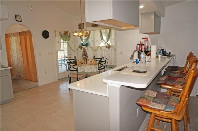 Impressive 4 Bedroom, 3 Bathroom POOL HOME with attached 2 Car on Deep Creek Golf Club in Florida - for sale on GolfHomes.com, golf home, golf lot
