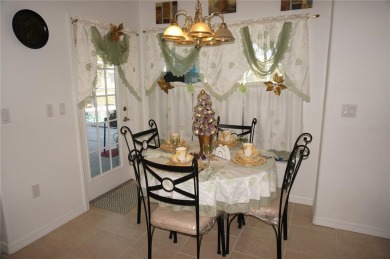 Impressive 4 Bedroom, 3 Bathroom POOL HOME with attached 2 Car on Deep Creek Golf Club in Florida - for sale on GolfHomes.com, golf home, golf lot