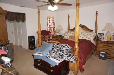 Impressive 4 Bedroom, 3 Bathroom POOL HOME with attached 2 Car on Deep Creek Golf Club in Florida - for sale on GolfHomes.com, golf home, golf lot