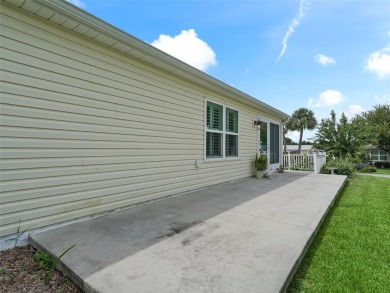 NO BOND!!  Water View!  This cozy Patio Villa is move in on Orange Blossom Hills Golf and Country Club in Florida - for sale on GolfHomes.com, golf home, golf lot