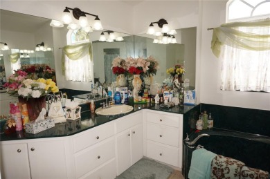 Impressive 4 Bedroom, 3 Bathroom POOL HOME with attached 2 Car on Deep Creek Golf Club in Florida - for sale on GolfHomes.com, golf home, golf lot