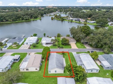 NO BOND!!  Water View!  This cozy Patio Villa is move in on Orange Blossom Hills Golf and Country Club in Florida - for sale on GolfHomes.com, golf home, golf lot