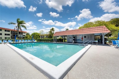 Charming one-bedroom, one and a half-bath condo in Hollybrook, a on Hollybrook Golf and Tennis Club  in Florida - for sale on GolfHomes.com, golf home, golf lot