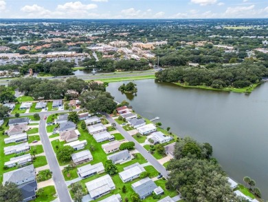 NO BOND!!  Water View!  This cozy Patio Villa is move in on Orange Blossom Hills Golf and Country Club in Florida - for sale on GolfHomes.com, golf home, golf lot