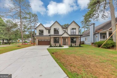 Step into flawless modern luxury at this brand-new custom-built on East Lake Golf Club in Georgia - for sale on GolfHomes.com, golf home, golf lot