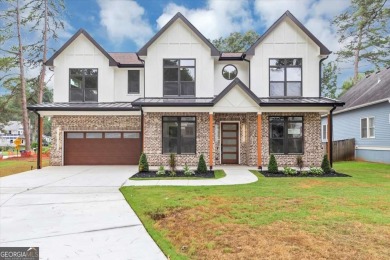 Step into flawless modern luxury at this brand-new custom-built on East Lake Golf Club in Georgia - for sale on GolfHomes.com, golf home, golf lot
