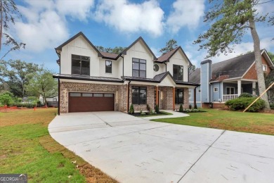 Step into flawless modern luxury at this brand-new custom-built on East Lake Golf Club in Georgia - for sale on GolfHomes.com, golf home, golf lot